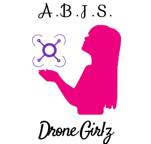 A pink silhouette of a woman holding a small device.